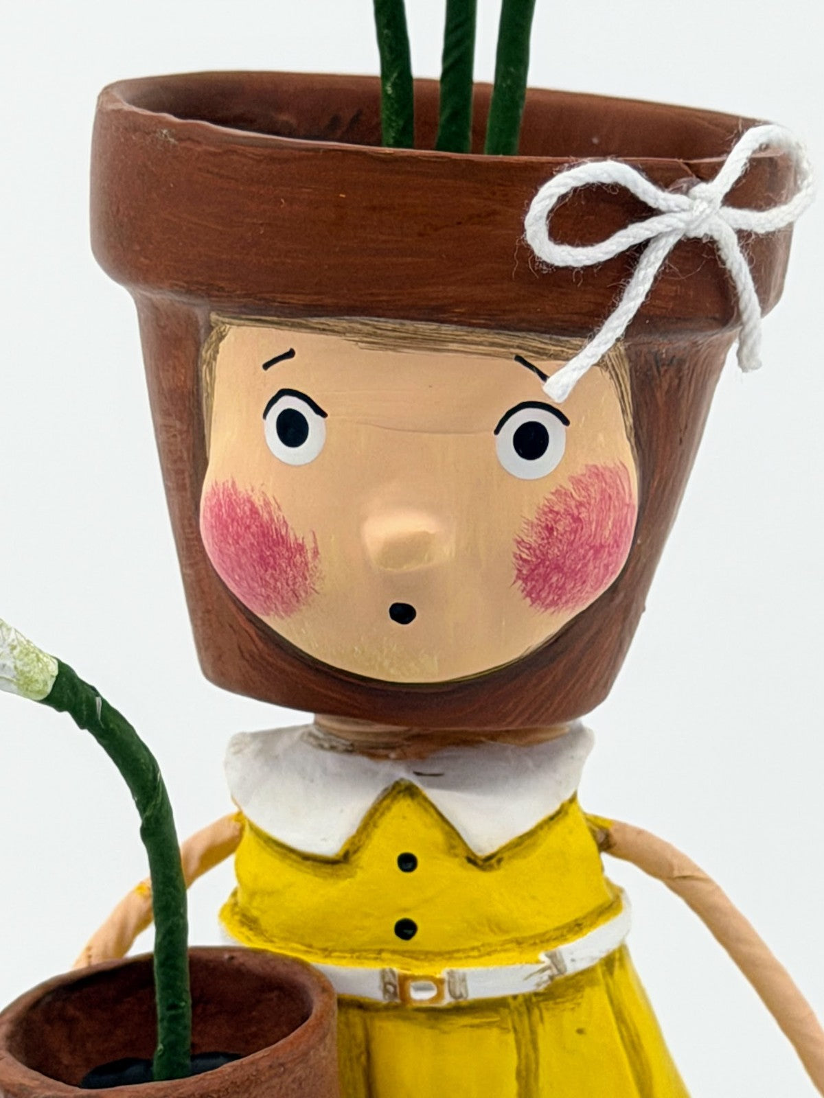 ESC Company: Lori Mitchell; Spring Figurine, Pot Head, Item# 18006