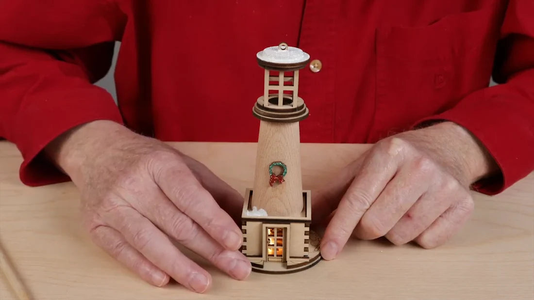 Old World Christmas: Holiday Lighthouse Ornament